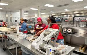 Papa Johns team members vounteering