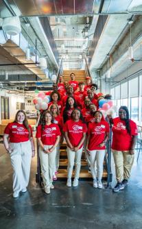 A group of young people at Papa Johns
