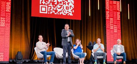 Nadeem Bajwa speaks at the 2023 Papa Johns Franchisee Conference