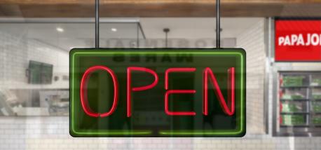 Open sign at Papa Johns restaurant